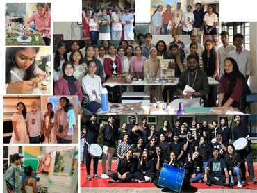 Two men in bicycle jerseys sitting outside at table having coffee
